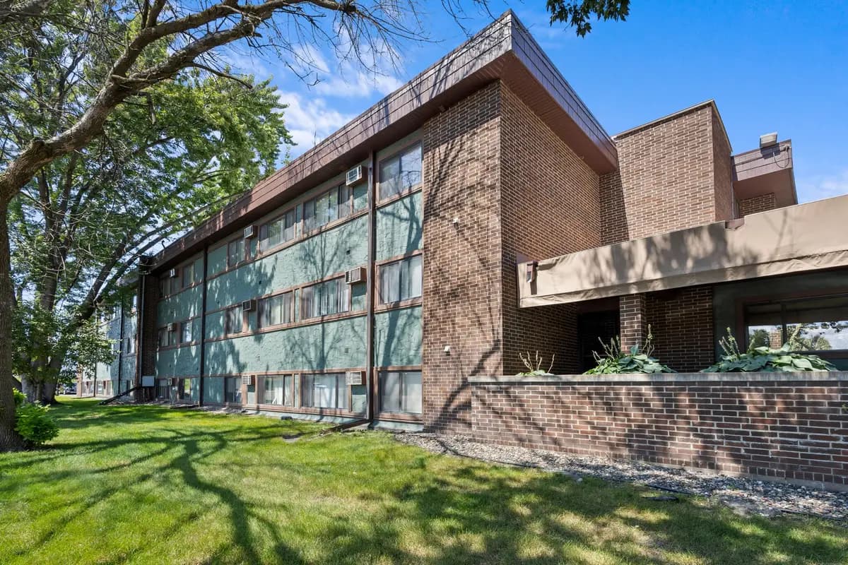 undefined apartments for rent - image - pebble-creek-north-apartments-brooklyn-park-mn-front-of-building.jpg