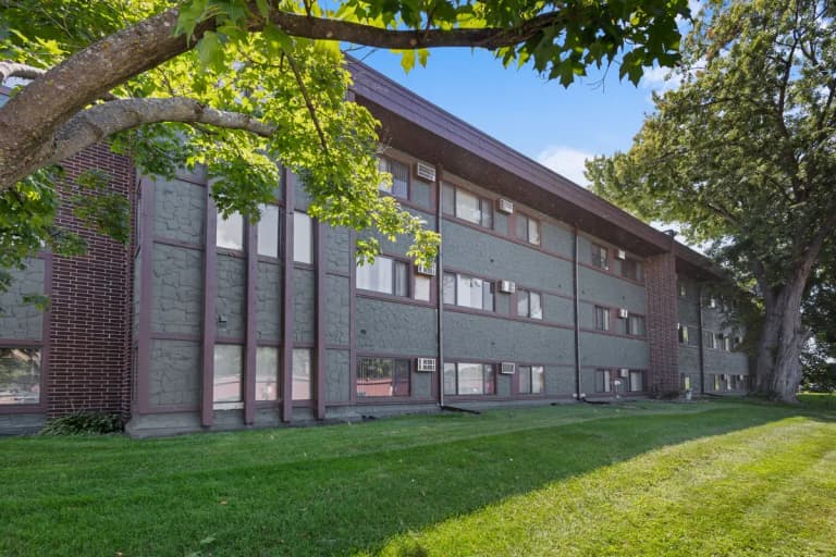 undefined apartments for rent - image - pebble-creek-north-apartments-brooklyn-park-mn-side-of-building.jpg